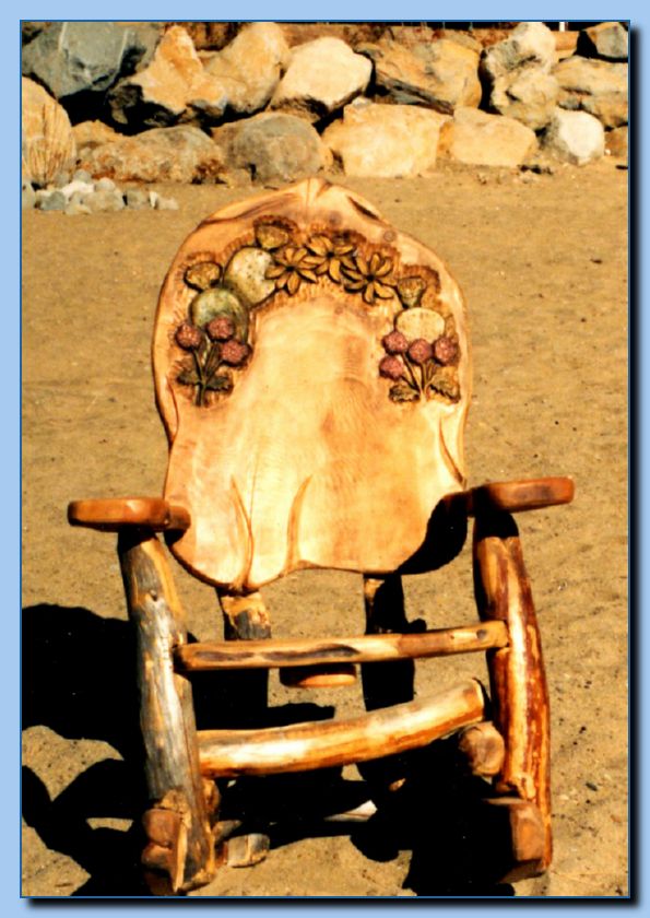 1-22 rocking chair with carved flowers